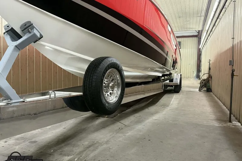 Slide: The Image of 2011 Cigarette 39' Top Gun Unlimited boat with World Champion Racing Team logo. - 9