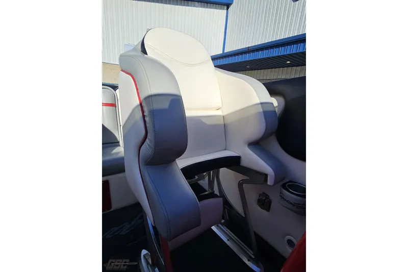 Slide: The Image of 2011 Cigarette 39' Top Gun Unlimited boat seat with white and gray upholstery. - 92