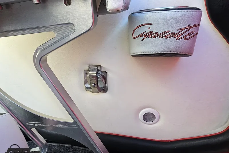 Slide: The Image of Interior detail of a 2011 Cigarette 39' Top Gun Unlimited boat, featuring branded elements. - 93