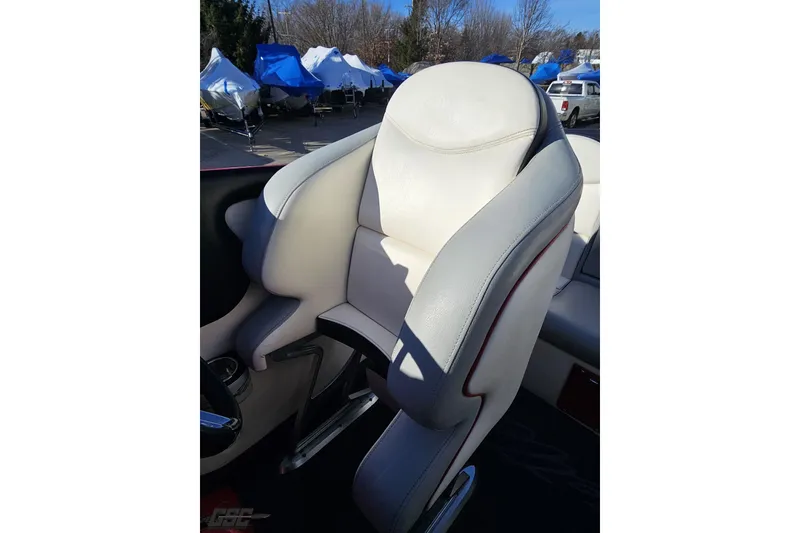 Slide: The Image of 2011 Cigarette 39' Top Gun Unlimited boat seat, white leather, outdoor setting. - 94