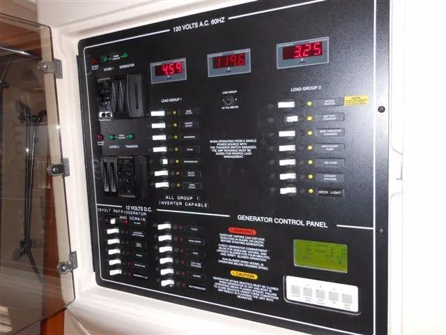 Slide: The Image of Generator control panel on a 2007 Grady-White Express 360 boat. - 23