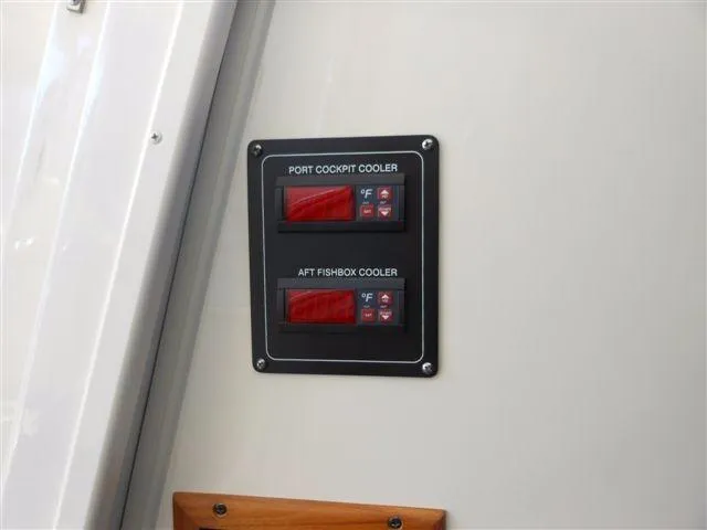 Slide: The Image of Cooler switches on 2007 Grady-White Express 360 boat. - 24