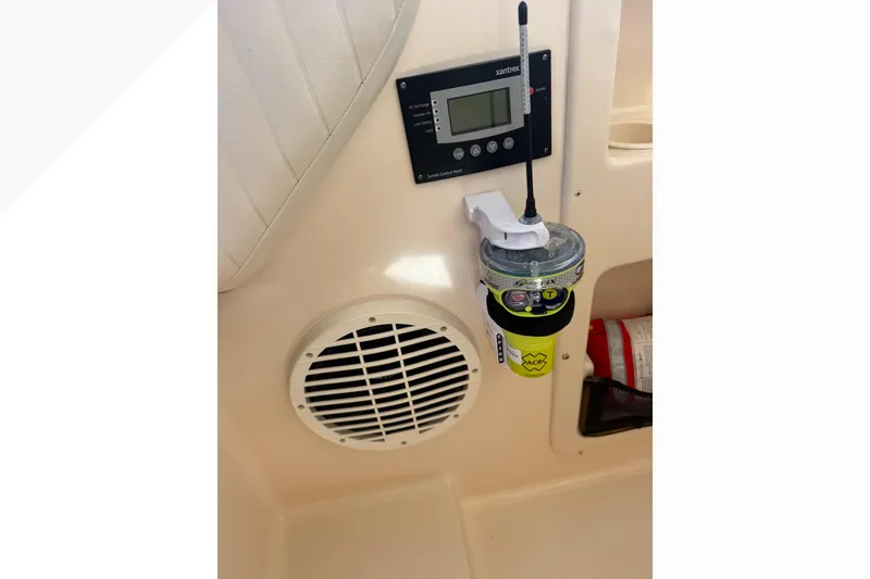 Slide: The Image of 2007 Grady-White Express 360 interior with control panel and emergency equipment. - 44