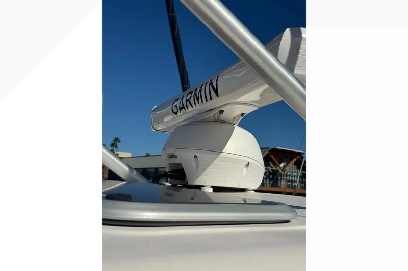 Slide: The Image of 2007 Grady-White Express 360 with Garmin radar against clear blue sky. - 53