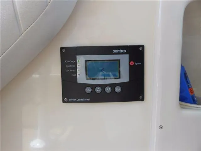 Slide: The Image of Xantrex system control panel on 2007 Grady-White Express 360. - 9