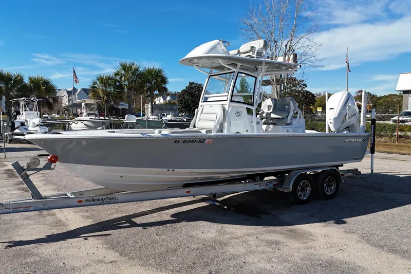 Slide: The Image of 2020 Sportsman Masters 267OE Bay Boat on trailer, parked outdoors. - 1