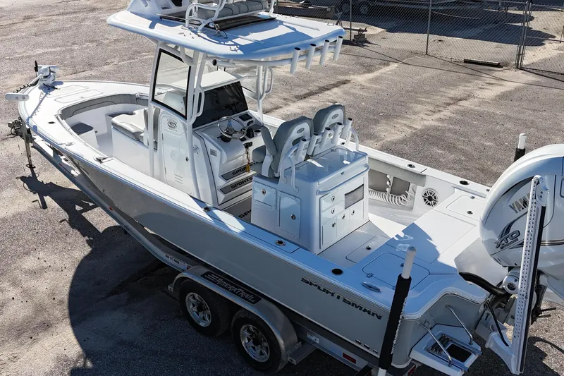 Slide: The Image of 2020 Sportsman Masters 267OE Bay Boat, aerial view of helm and seating area. - 11
