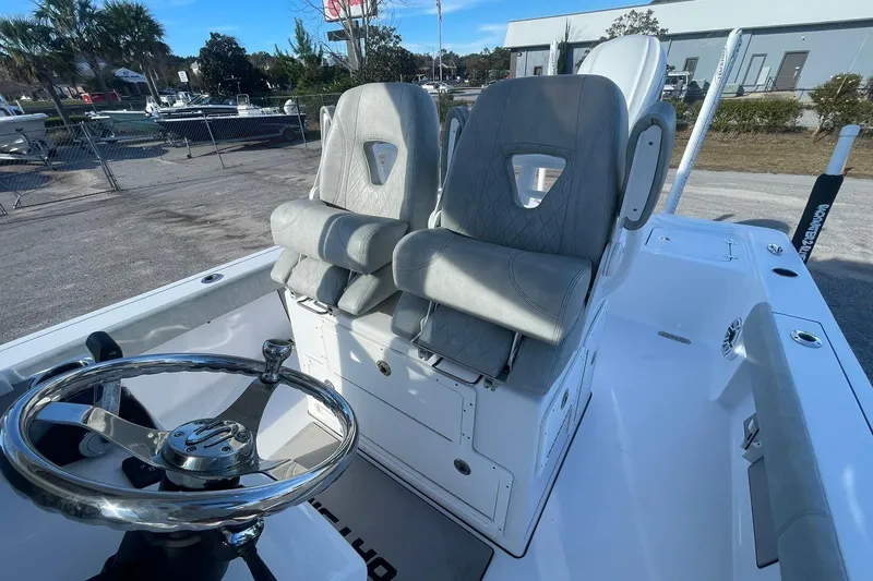 Slide: The Image of 2020 Sportsman Masters 267OE Bay Boat interior with toilet and battery compartment. - 23