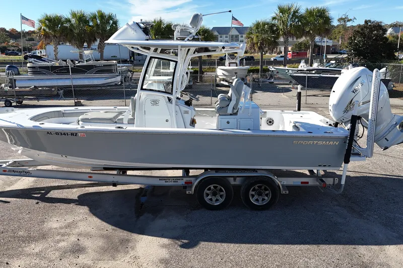 Slide: The Image of 2020 Sportsman Masters 267OE Bay Boat on trailer, parked outdoors. - 3