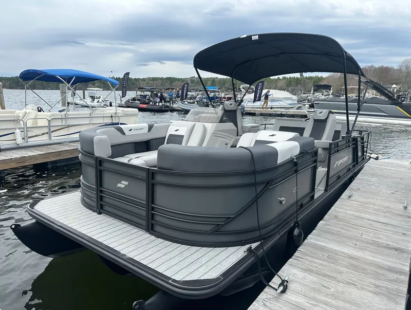 Slide: The Image of 2026 Starcraft SLS 3 R pontoon boat docked. - 3