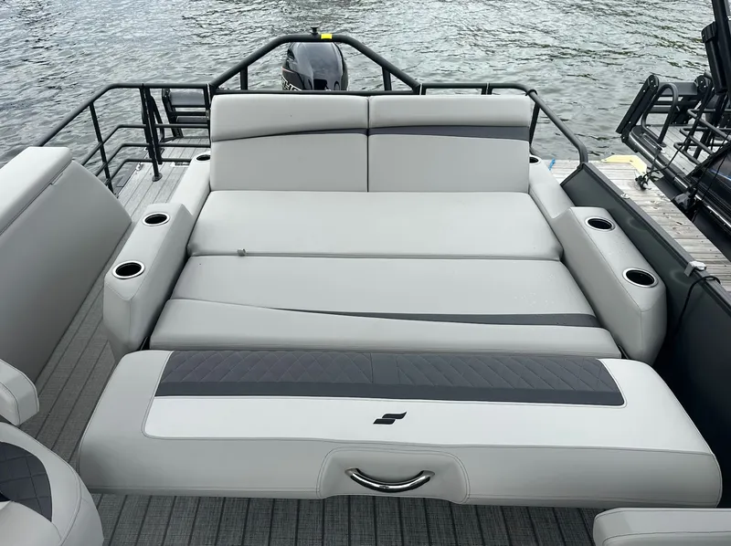 Slide: The Image of 2026 Starcraft SLS 3 R boat with luxurious lounge seating. - 8