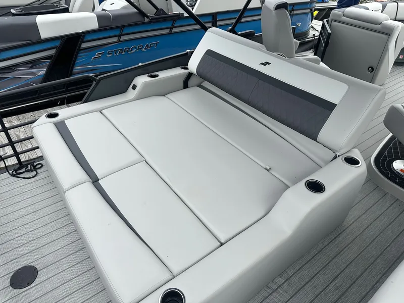 Slide: The Image of Starcraft SLS 3 R 2026 boat with luxurious lounge seating. - 9