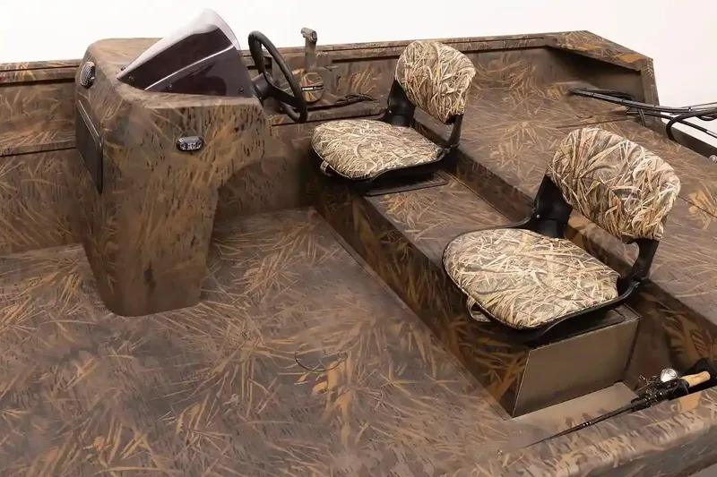 Slide: The Image of Steering console of 2026 G3 Gator Tough 20 SC boat, featuring camo design. - 3