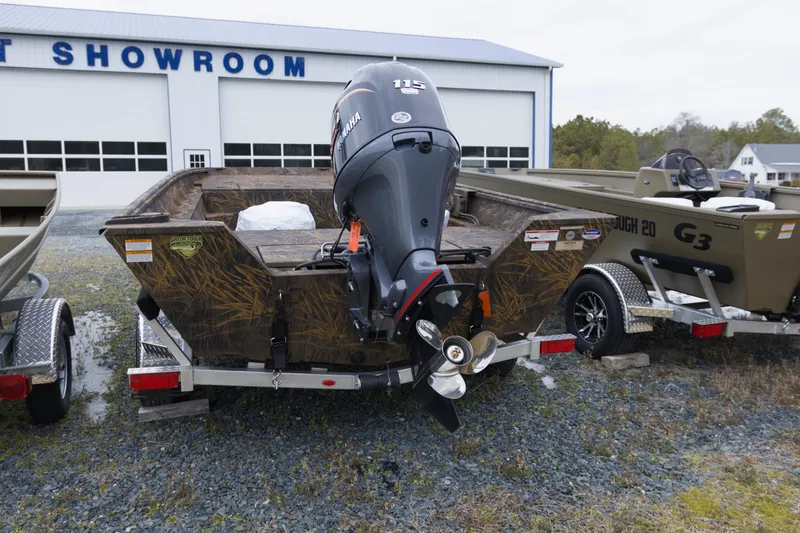 Slide: The Image of 2026 G3 Gator Tough 20 SC boat with Yamaha motor at dealership showroom. - 7