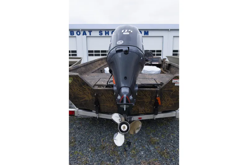 Slide: The Image of 2026 G3 Gator Tough 20 SC boat with 115 HP outboard motor at dealership. - 8