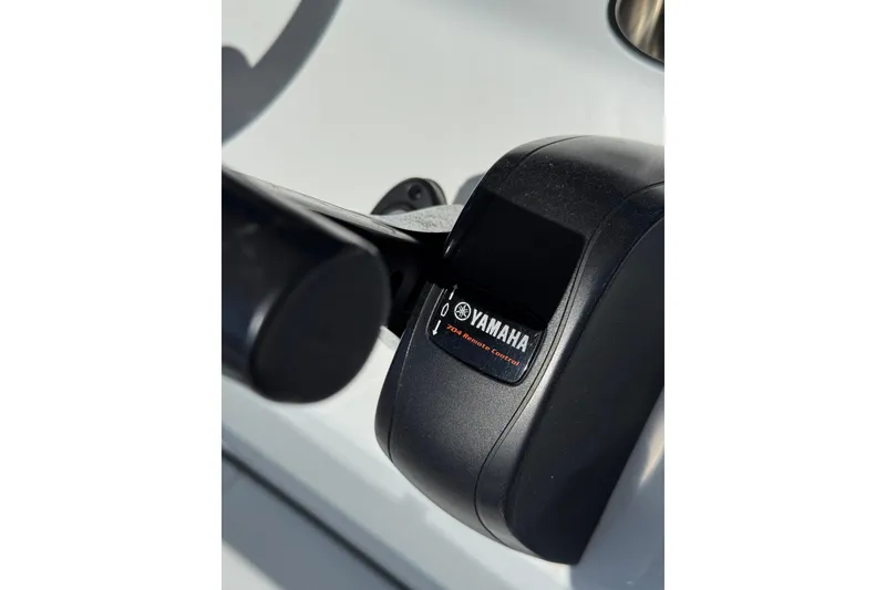 Slide: The Image of Close-up of Yamaha 704 remote control on 2018 Yellowfin 21 Bay boat. - 16