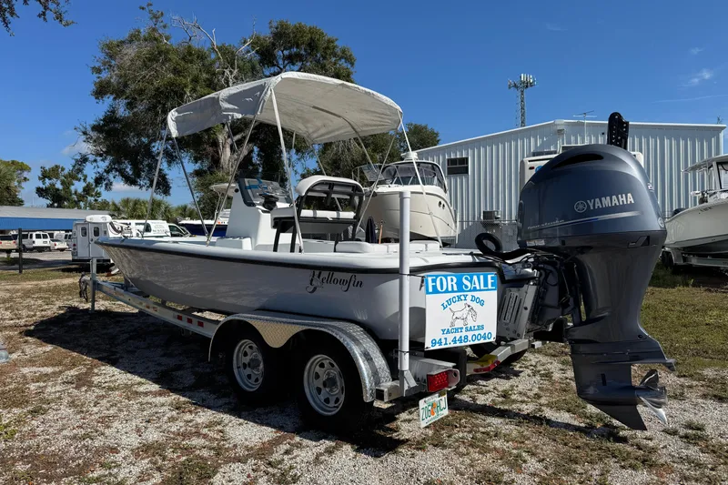 Slide: The Image of 2018 Yellowfin 21 Bay boat for sale, equipped with Yamaha engine, on trailer. - 4