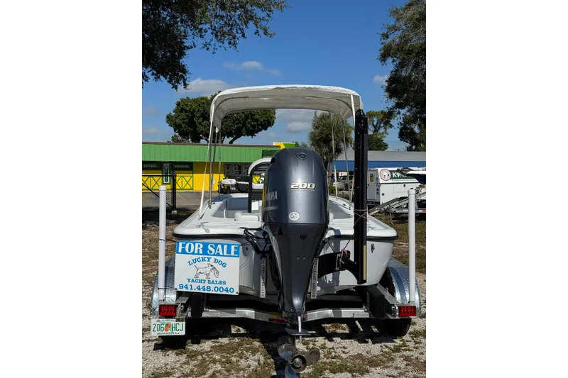 Slide: The Image of 2018 Yellowfin 21 Bay boat for sale with Yamaha 200 engine, displayed on trailer. - 5