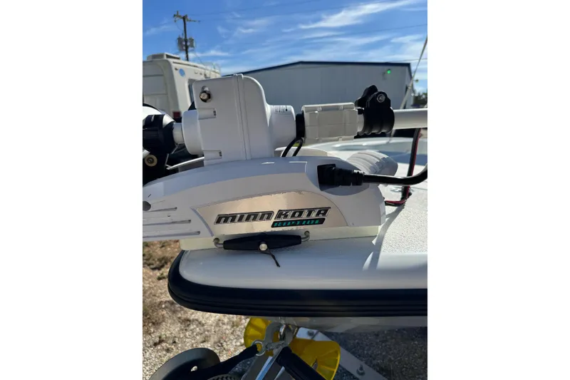 Slide: The Image of Minn Kota trolling motor on 2018 Yellowfin 21 Bay boat, outdoor setting. - 9