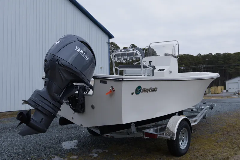 Slide: The Image of 2026 May-Craft 208 CC boat with Yamaha engine on trailer, parked outdoors. - 9
