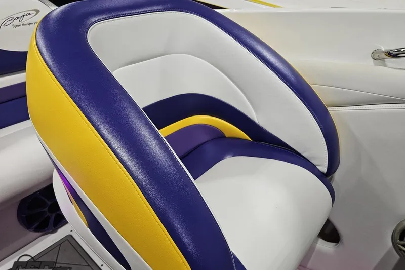 Slide: The Image of Colorful seat design in a 2003 Baja 25 Outlaw boat interior. - 69