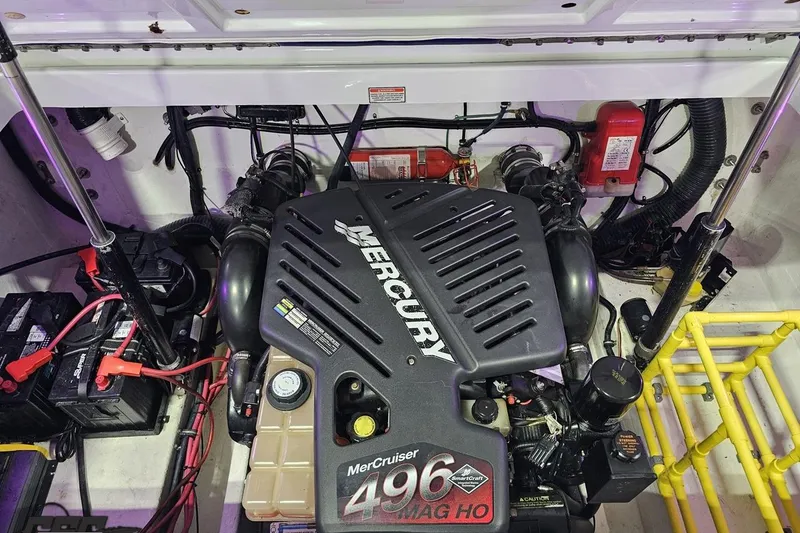 Slide: The Image of Engine compartment of a 2003 Baja 25 Outlaw with Mercury 496 Mag HO engine. - 94