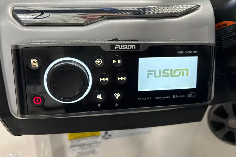 Slide: The Image of Fusion MS-UD650 stereo system on 2018 Regal 23 OBX boat dashboard. - 28