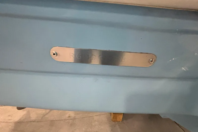 Slide: The Image of 2018 Regal 23 OBX boat with Yamaha outboard motor in showroom. - 6