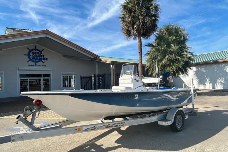 Slide: The Image of 2017 Blue Wave 1900 STL boat on trailer at Gulf Coast Marine dealership. - 1