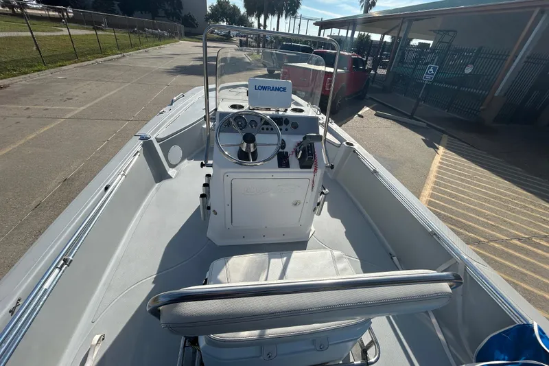 Slide: The Image of 2017 Blue Wave 1900 STL boat with steering console and Lowrance equipment. - 11