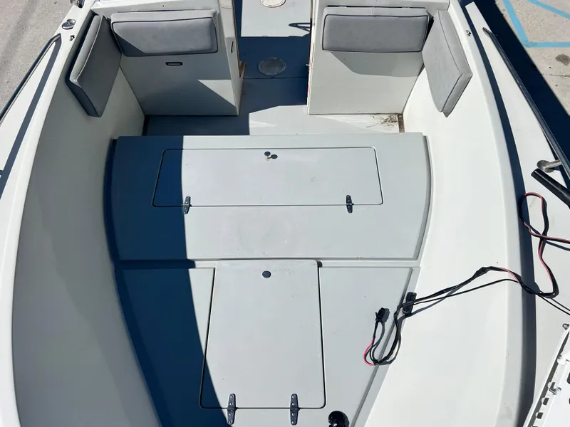 Slide: The Image of Interior of a 1986 Wellcraft V-20 Sport boat, gray upholstery. - 12