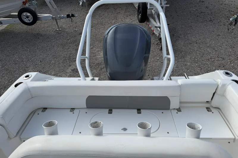 Slide: The Image of 2014 Tidewater 230 LXF boat interior with seating and rod holders. - 19