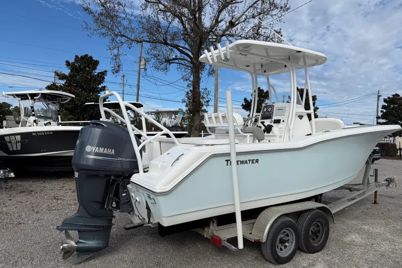 Slide: The Image of 2014 Tidewater 230 LXF boat on trailer with Yamaha outboard motor. - 3