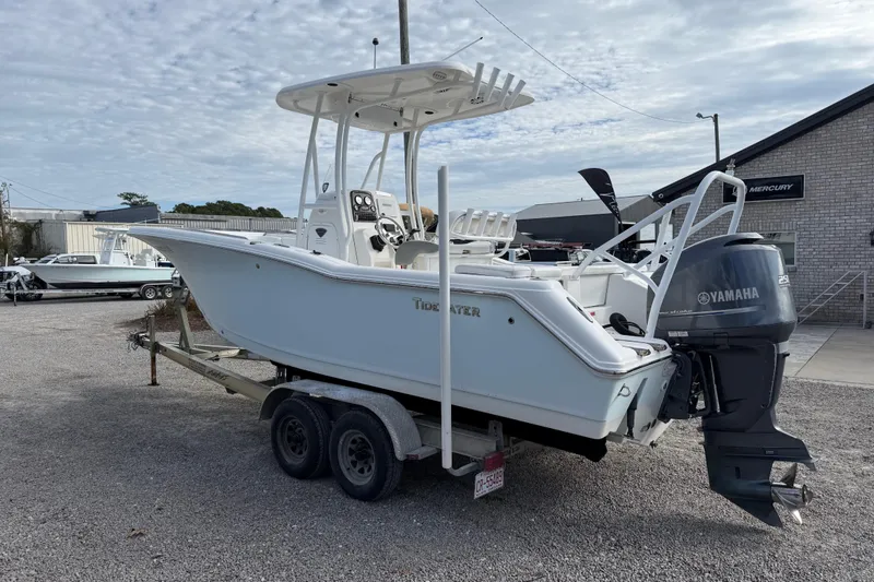 Slide: The Image of 2014 Tidewater 230 LXF boat on trailer with Yamaha outboard motor. - 7