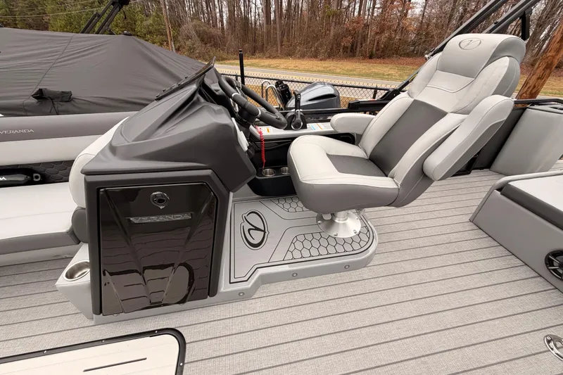 Slide: The Image of Captain's chair and console of 2026 Veranda VR 235 VL pontoon boat, featuring sleek design. - 10