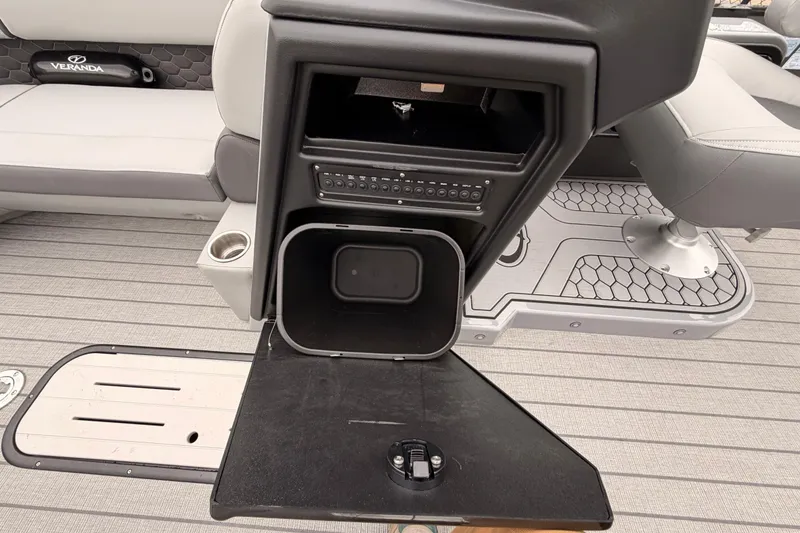 Slide: The Image of Interior of 2026 Veranda VR 235 VL boat with seating and storage compartments. - 11