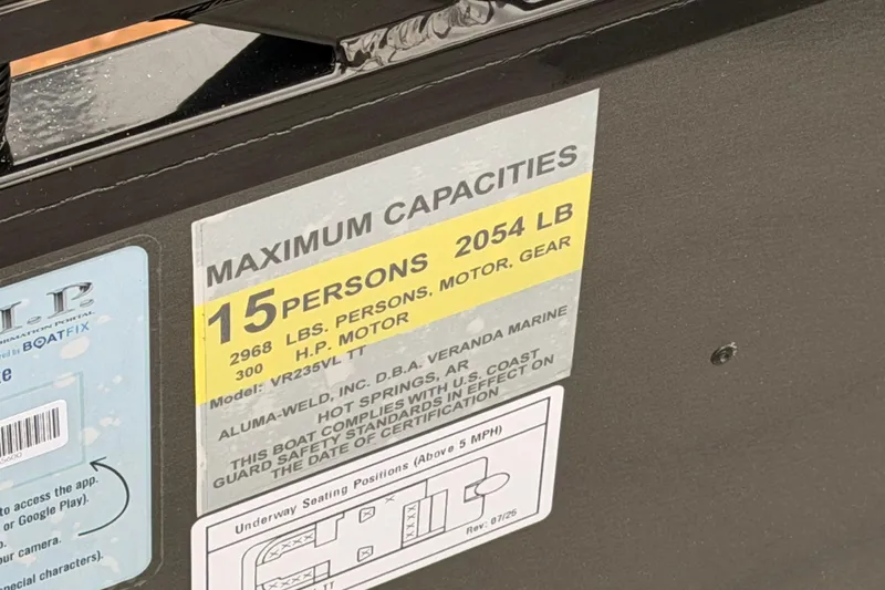 Slide: The Image of 2026 Veranda VR 235 VL capacity label: 15 persons, 2054 lbs, 300 HP motor. - 13