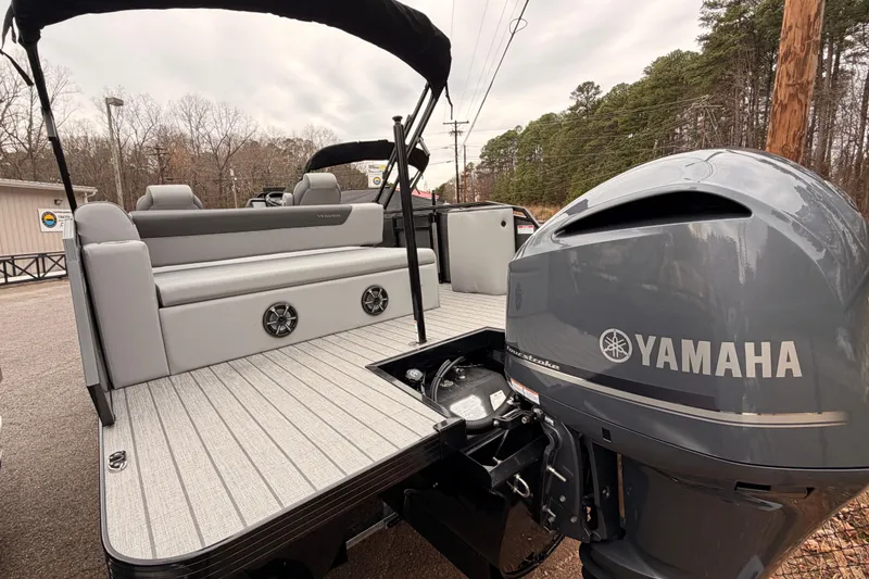 Slide: The Image of 2026 Veranda VR 235 VL pontoon boat with Yamaha outboard motor, docked outdoors. - 5