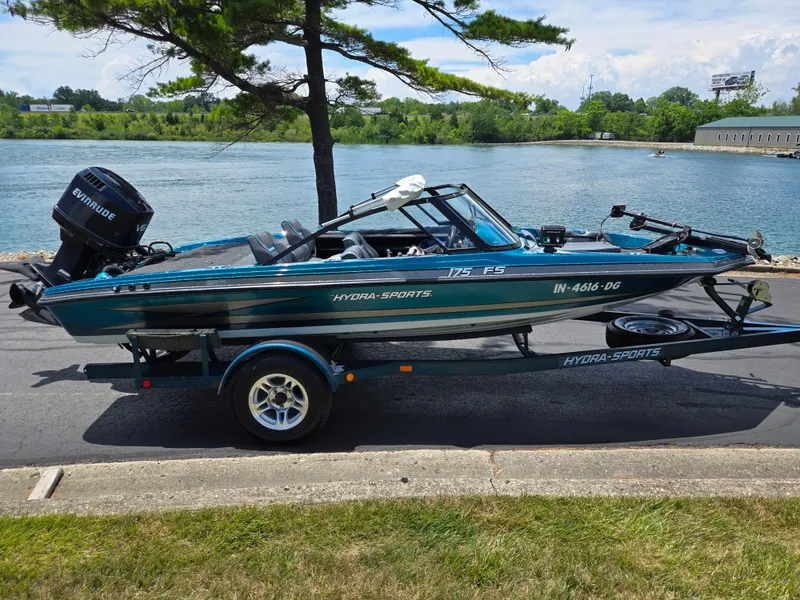 Slide: The Image of 1994 Hydra-Sports 175 FS boat on trailer by a scenic lake. - 10