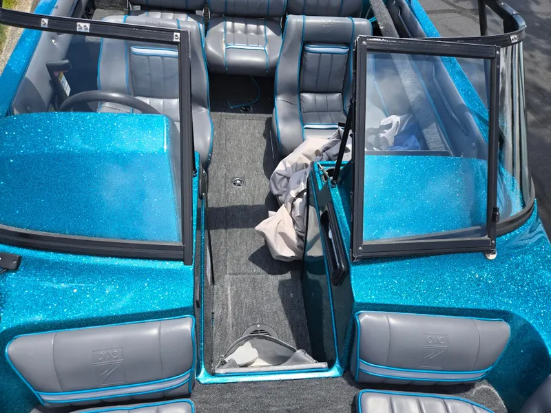Slide: The Image of 1994 Hydra-Sports 175 FS boat interior with blue glitter finish and gray seating. - 18