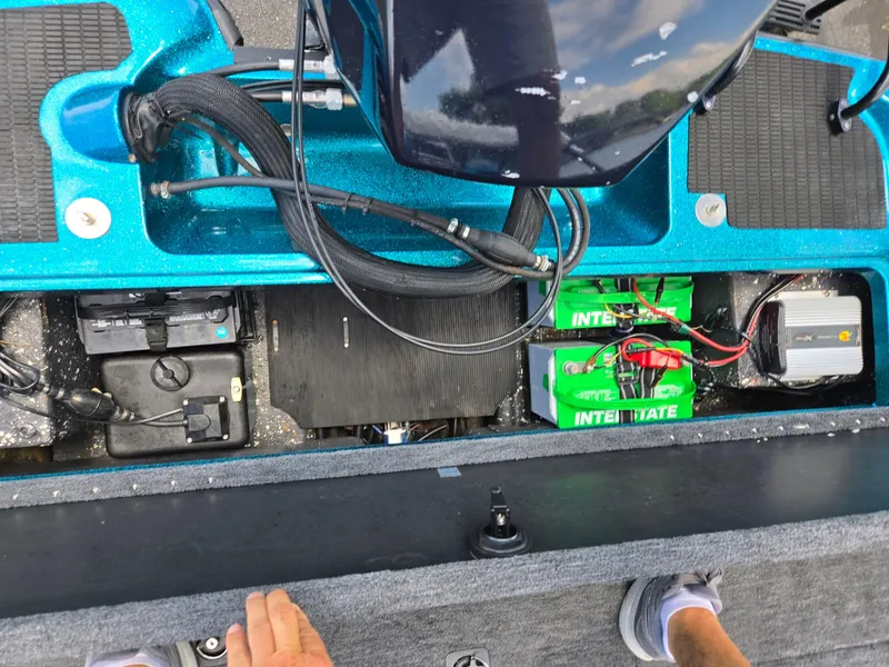 Slide: The Image of 1994 Hydra-Sports 175 FS boat interior showing battery compartment and wiring setup. - 22