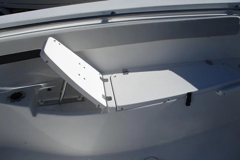 Slide: The Image of 2026 Sea Pro 262 Offshore boat interior with foldable seating. - 13