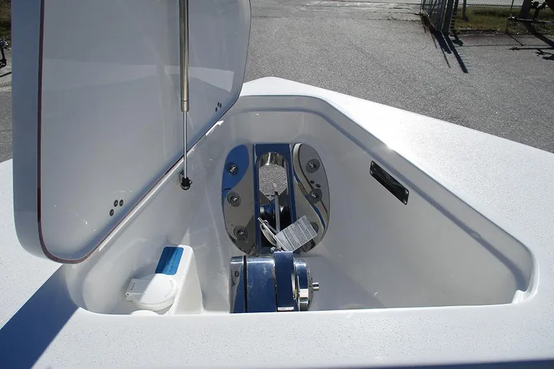 Slide: The Image of Open anchor compartment on 2026 Sea Pro 262 Offshore boat, showcasing storage and equipment. - 21