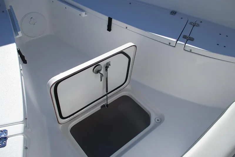 Slide: The Image of 2026 Sea Pro 262 Offshore boat storage compartment with open hatch. - 23