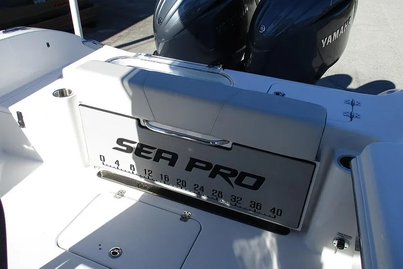 Slide: The Image of 2026 Sea Pro 262 Offshore boat interior with Yamaha engines, featuring a measuring board. - 29