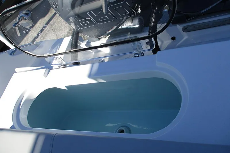 Slide: The Image of 2026 Sea Pro 262 Offshore boat interior with open storage compartment. - 33