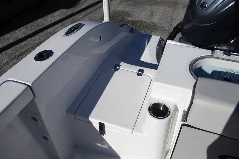 Slide: The Image of 2026 Sea Pro 262 Offshore boat deck with storage compartment and cup holder. - 36