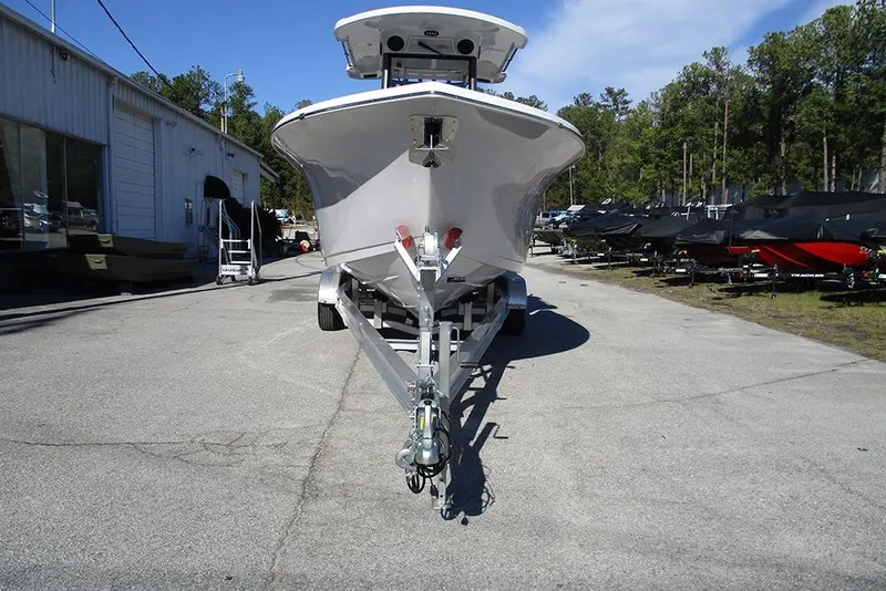 Slide: The Image of 2026 Sea Pro 262 Offshore boat on trailer in outdoor dealership lot. - 4