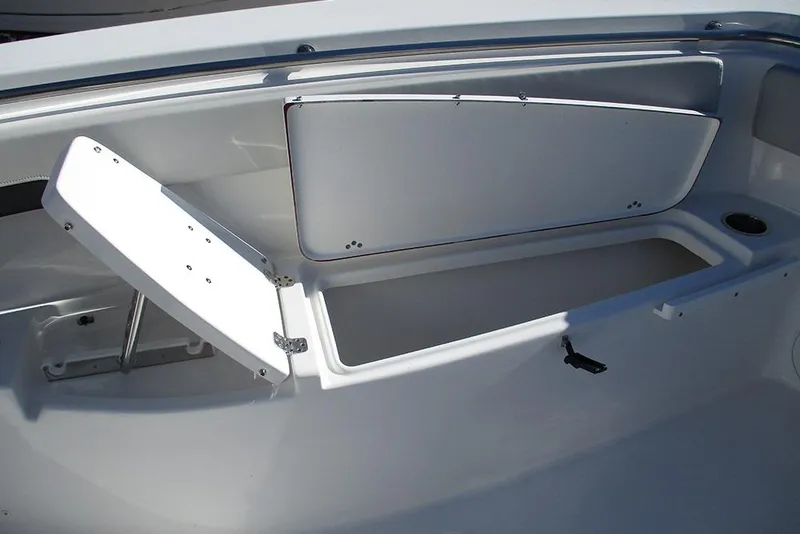 Slide: The Image of 2026 Sea Pro 262 Offshore boat storage compartment with open hatch. - 14