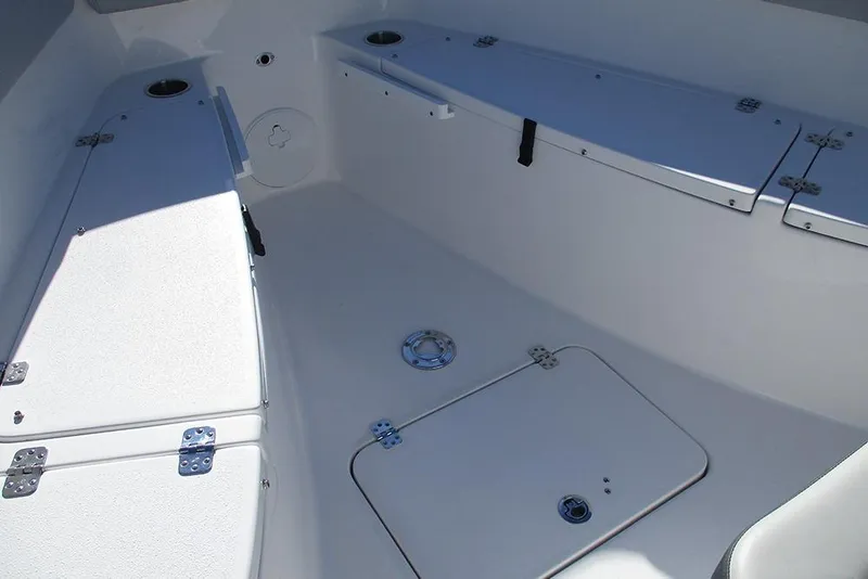 Slide: The Image of 2026 Sea Pro 262 Offshore boat interior with storage compartments and seating. - 22